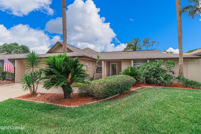 129 Sand Fiddler Ct, Daytona Beach, FL 32119 - single story home with a front yard and concrete driveway