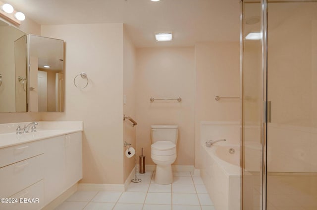 full bathroom featuring toilet, independent shower and bath, vanity, and tile patterned floors