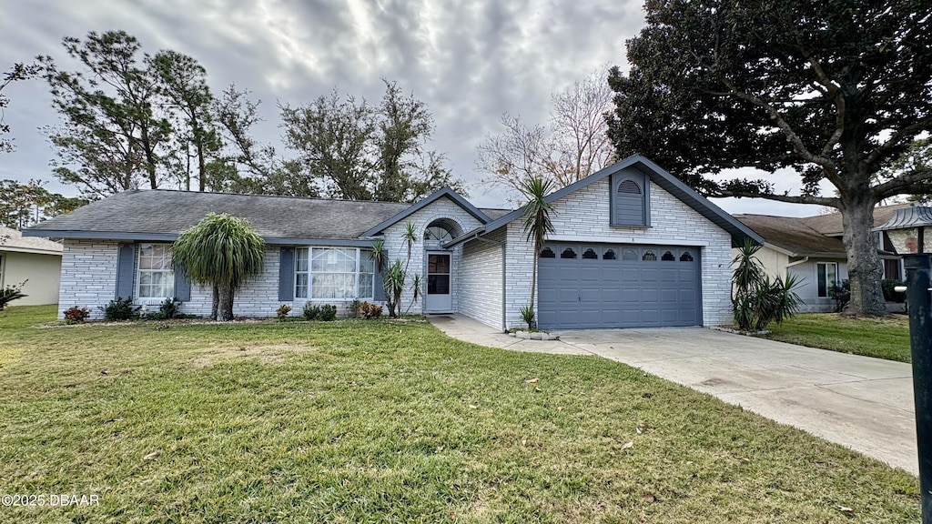 single story home featuring a front yard and a garage