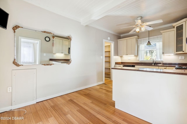 kitchen featuring beam ceiling, ceiling fan, wooden ceiling, pendant lighting, and light hardwood / wood-style floors