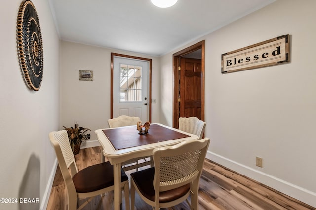 dining area featuring hardwood / wood-style floors