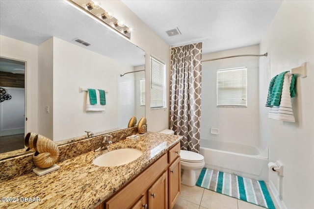 full bathroom with toilet, tile patterned flooring, a textured ceiling, vanity, and shower / bath combination with curtain