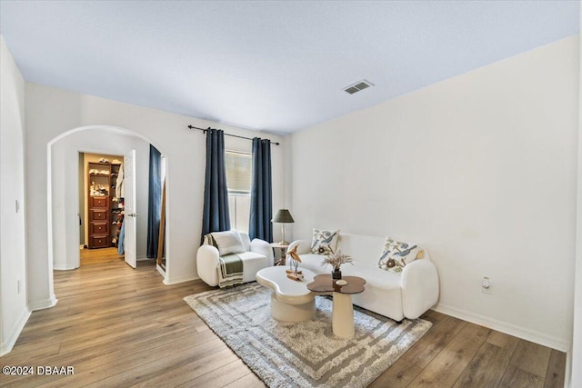 living room with hardwood / wood-style flooring