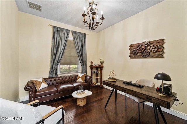 office area with a textured ceiling, a notable chandelier, and hardwood / wood-style flooring