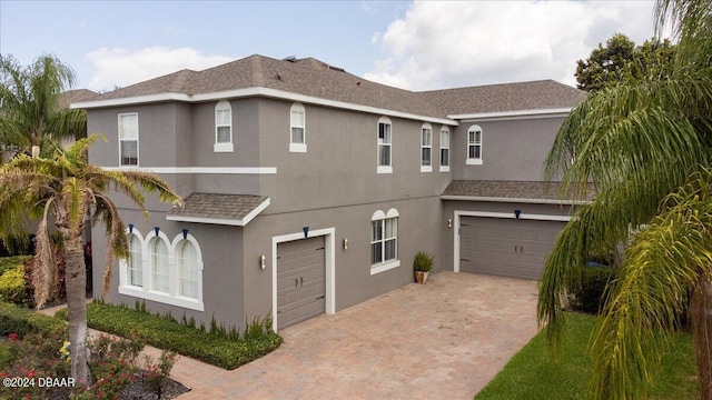 view of front of home with a garage