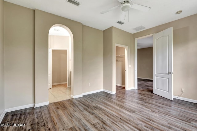 253 Catriona Dr, Daytona Beach, FL 32124 - spare room with wood finished floors, ceiling fan, and visible vents