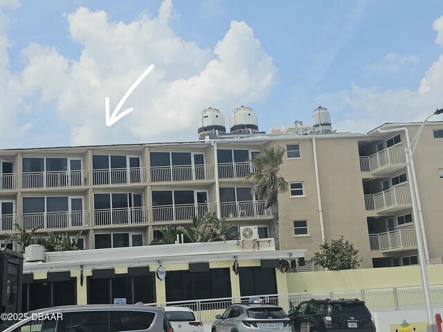 219 S Atlantic Ave Unit 428, Daytona Beach, FL 32118 - view of apartment building / complex