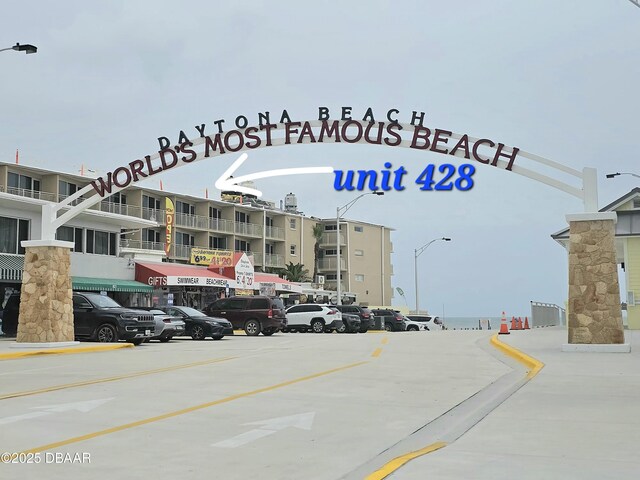 219 S Atlantic Ave Unit 428, Daytona Beach, FL 32118 - view of road featuring street lights and curbs