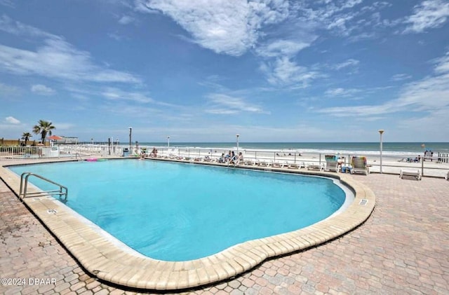 pool featuring a water view