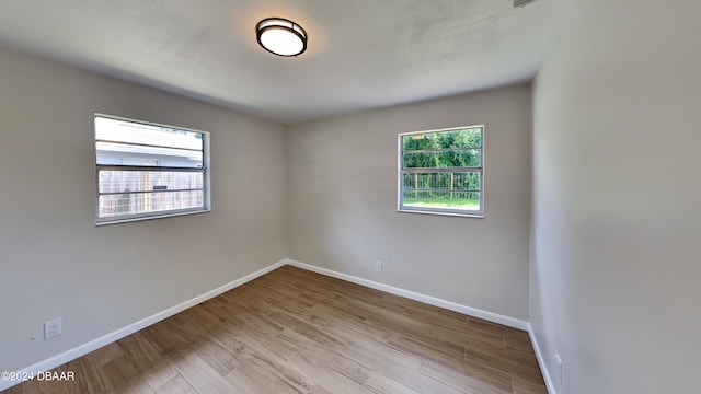 empty room with light wood-type flooring