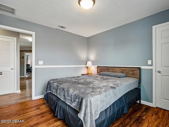 19 Abacus Ave, Ormond Beach, FL 32174 - bedroom with wood finished floors and baseboards
