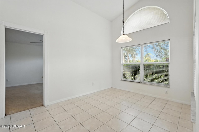 918 Brookridge Ln, Ormond Beach, FL 32174 - spare room featuring light tile patterned floors and high vaulted ceiling