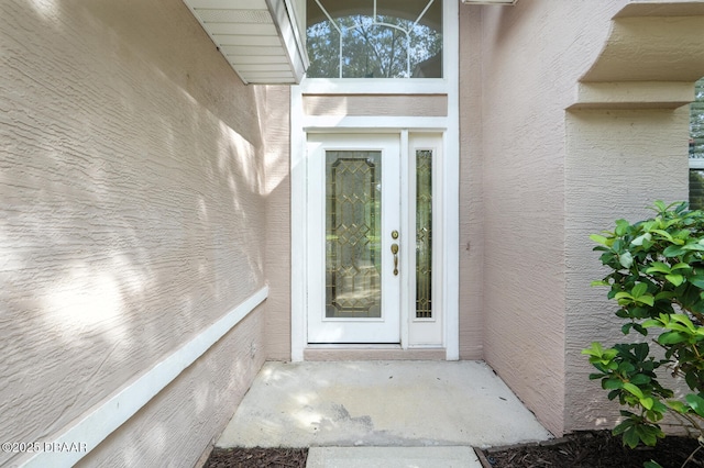 918 Brookridge Ln, Ormond Beach, FL 32174 - property entrance with stucco siding
