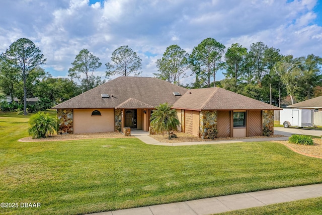 ranch-style house with a front yard