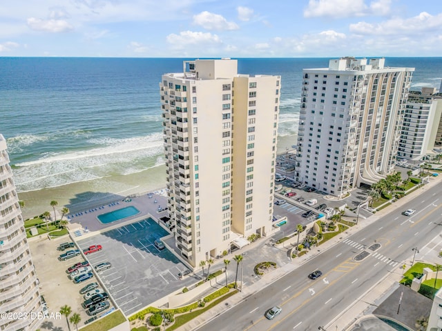 aerial view featuring a water view and a beach view