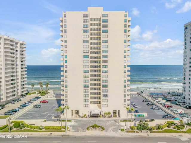 view of building exterior with a water view