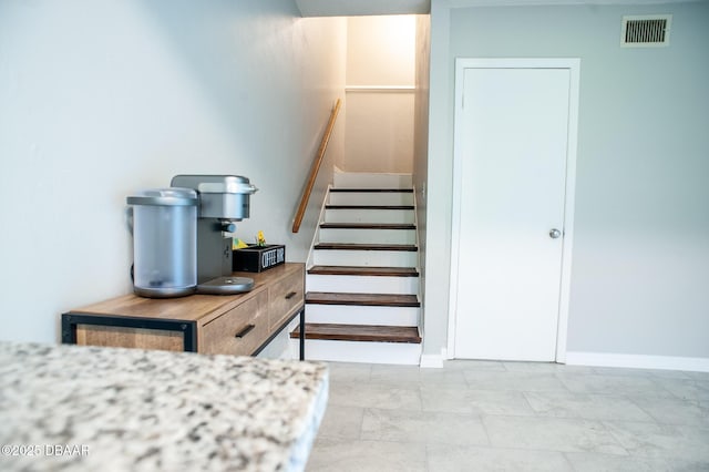 2 Springwood Sq, Port Orange, FL 32129 - staircase featuring baseboards