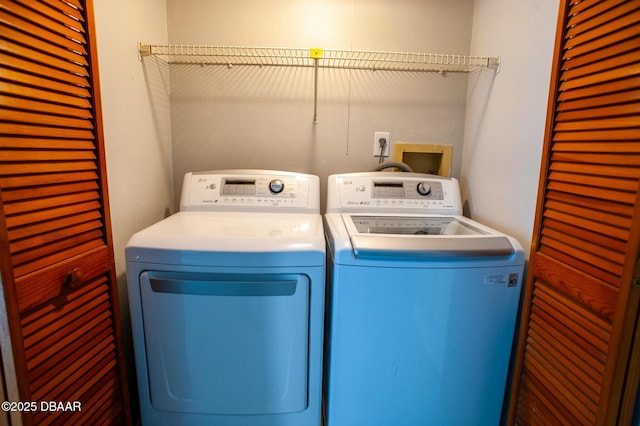 2 Springwood Sq, Port Orange, FL 32129 - clothes washing area with separate washer and dryer