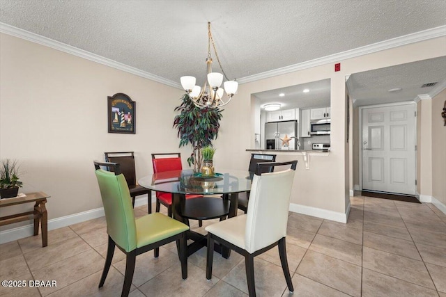 4505 S Atlantic Ave Unit 605, Ponce Inlet, FL 32127 - dining space featuring a textured ceiling, ornamental molding, a chandelier, and light tile patterned flooring