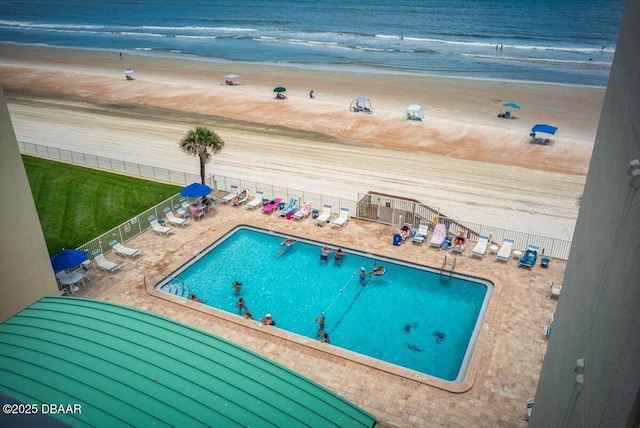 4505 S Atlantic Ave Unit 605, Ponce Inlet, FL 32127 - community pool featuring a patio and view of water and beach