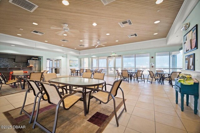 4505 S Atlantic Ave Unit 605, Ponce Inlet, FL 32127 - dining area featuring light tile patterned floors, wooden ceiling, ornamental molding, a ceiling fan, and recessed lighting