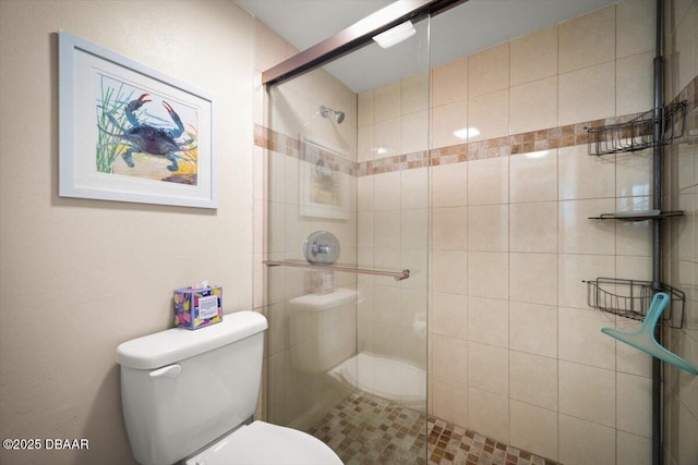 4505 S Atlantic Ave Unit 605, Ponce Inlet, FL 32127 - bathroom with toilet and tiled shower