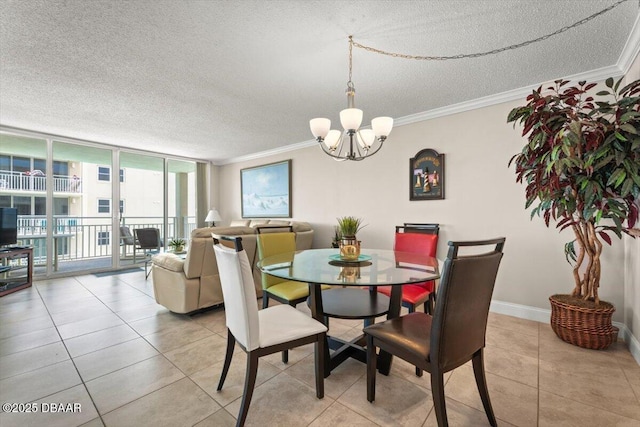 4505 S Atlantic Ave Unit 605, Ponce Inlet, FL 32127 - dining area with a textured ceiling, a chandelier, crown molding, light tile patterned flooring, and floor to ceiling windows