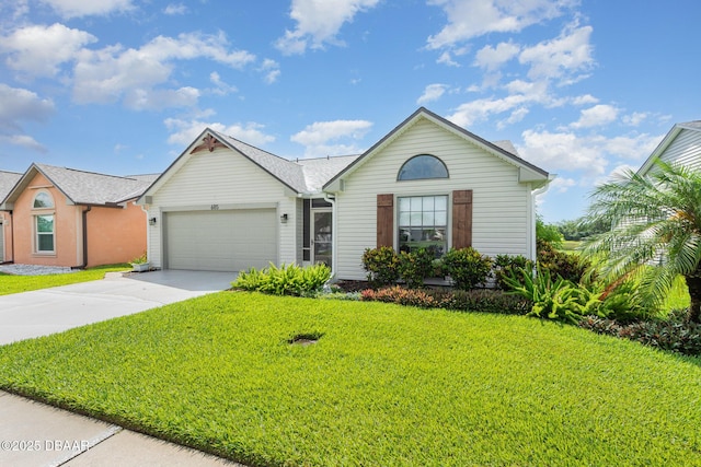685 Middlebury Loop, New Smyrna Beach, FL 32168 - ranch-style home featuring driveway, a garage, and a front yard