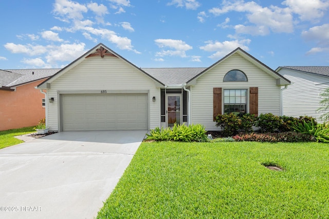 685 Middlebury Loop, New Smyrna Beach, FL 32168 - single story home featuring a garage, driveway, and a front yard
