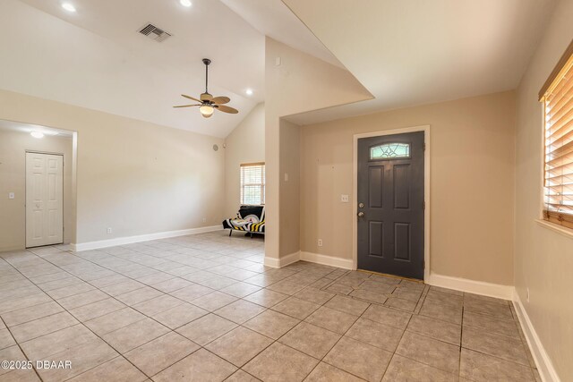 121 Palm Dr, Daytona Beach, FL 32117 - entryway featuring ceiling fan, light tile patterned floors, baseboards, high vaulted ceiling, and recessed lighting