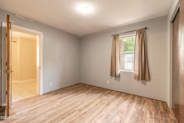 121 Palm Dr, Daytona Beach, FL 32117 - empty room with light wood-style flooring