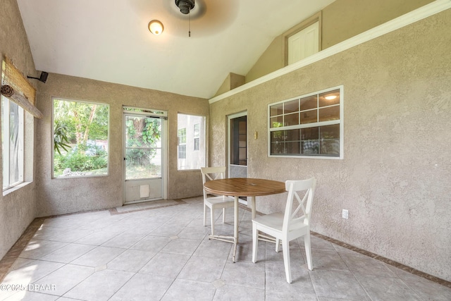 121 Palm Dr, Daytona Beach, FL 32117 - sunroom featuring vaulted ceiling and healthy amount of natural light