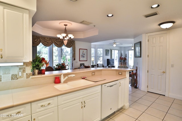 kitchen with hanging light fixtures, sink, white cabinets, dishwasher, and ceiling fan with notable chandelier