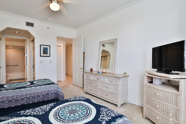 bedroom with light carpet, crown molding, and ceiling fan