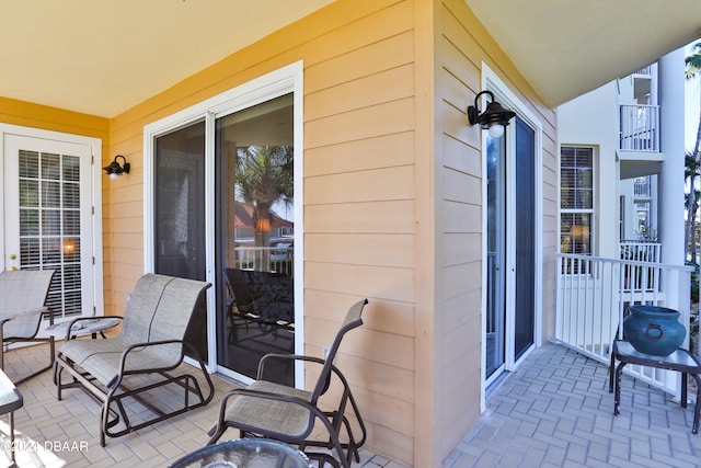 view of patio with a balcony