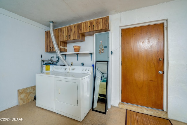 laundry room with washer and clothes dryer