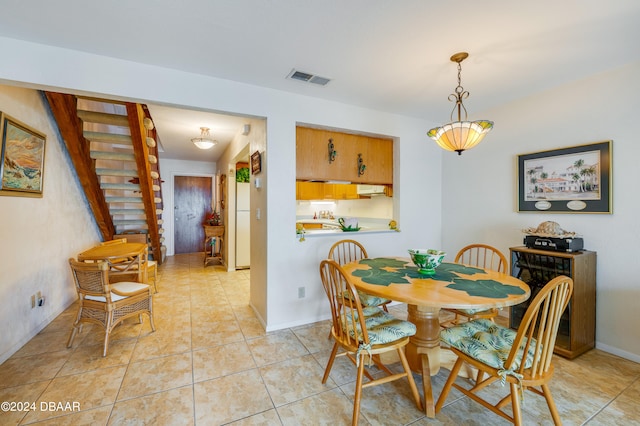 view of tiled dining space