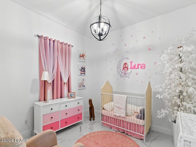 bedroom with a chandelier and a crib