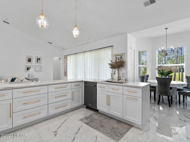 kitchen featuring vaulted ceiling, dishwasher, white cabinets, sink, and pendant lighting