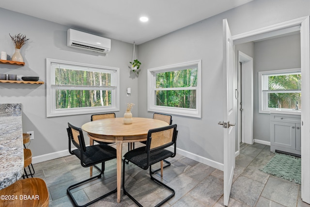 dining area with an AC wall unit