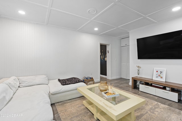 living room featuring coffered ceiling and wood-type flooring