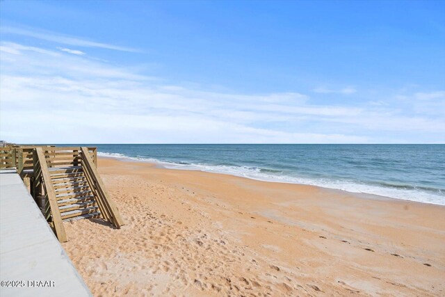 property view of water with a beach view