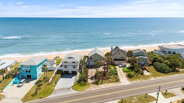 bird's eye view with a beach view and a water view