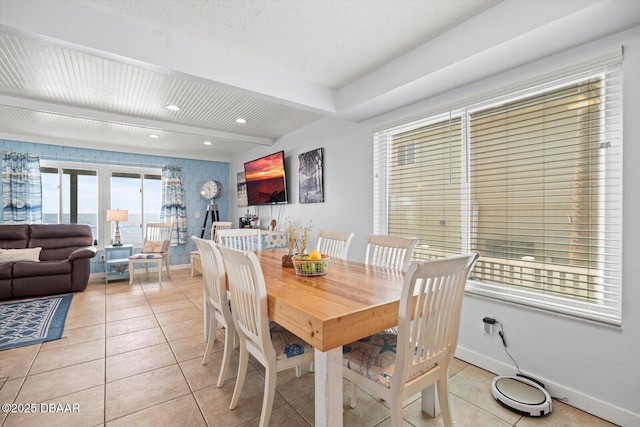 dining area with light tile patterned floors