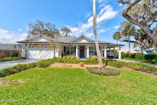 ranch-style house with driveway, ceiling fan, a front lawn, and an attached garage