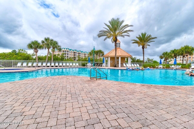 view of pool featuring a patio