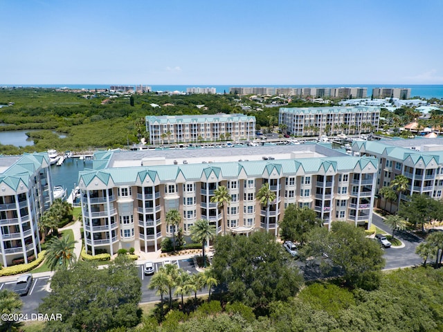 drone / aerial view with a water view