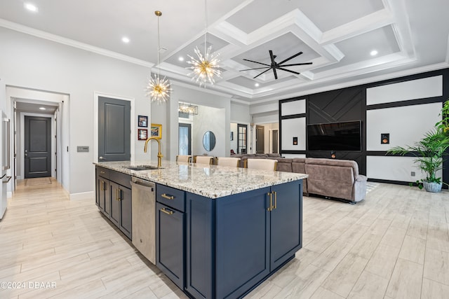 kitchen featuring sink, coffered ceiling, light stone counters, pendant lighting, and a kitchen island with sink