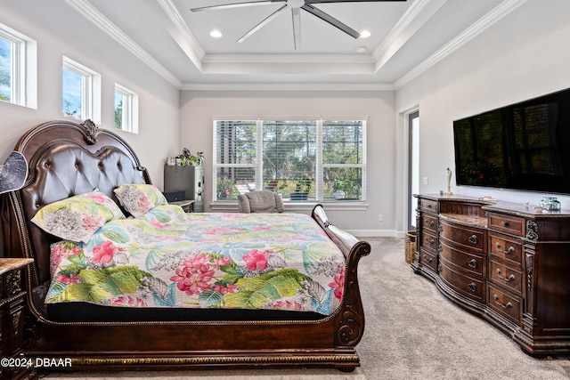 bedroom featuring ceiling fan, light colored carpet, crown molding, and multiple windows