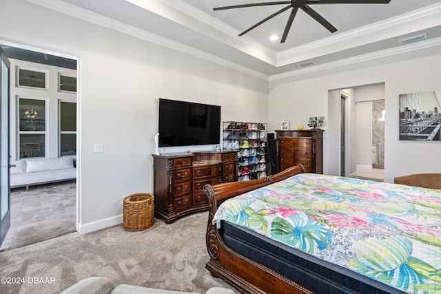 bedroom with light colored carpet, ensuite bath, ceiling fan, and ornamental molding